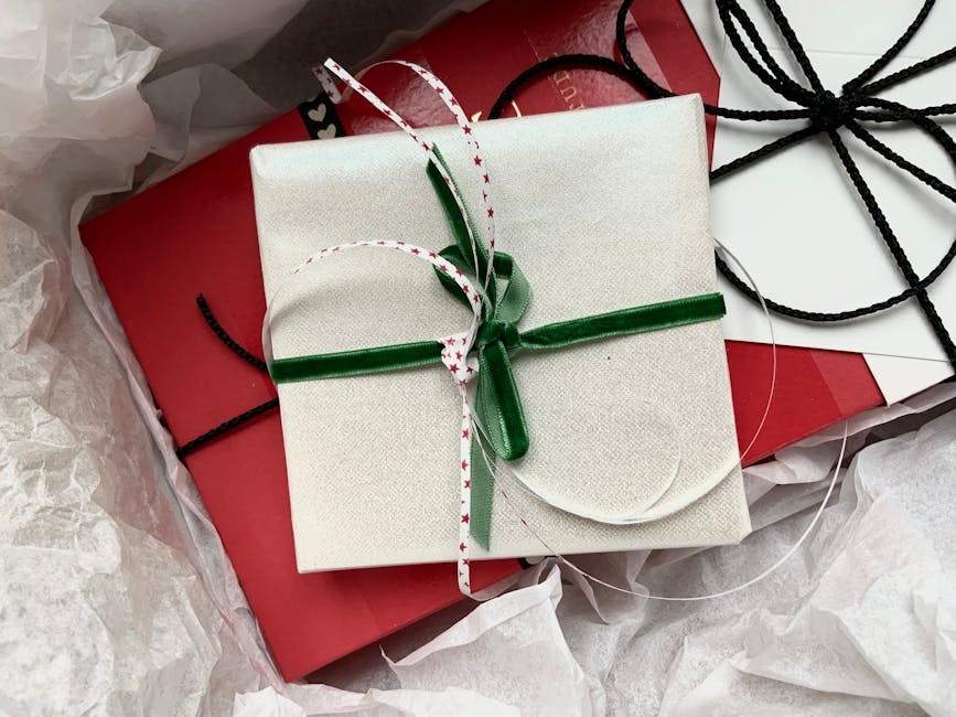 Beautifully wrapped birthday gift boxes with colourful ribbons and bows, ideal birthday gift ideas for a new friend