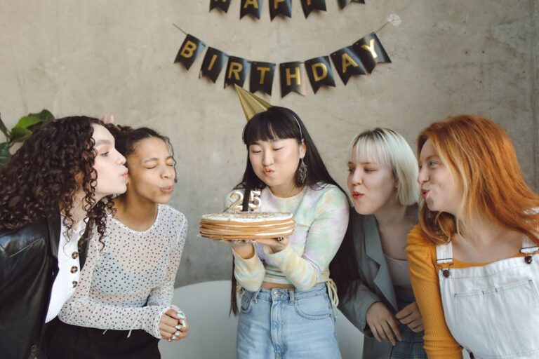 Diverse group of women celebrating a birthday together, representing the global tradition of saying happy birthday in different languages