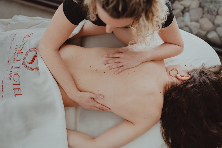 Woman enjoying a relaxing massage at a luxury spa retreat